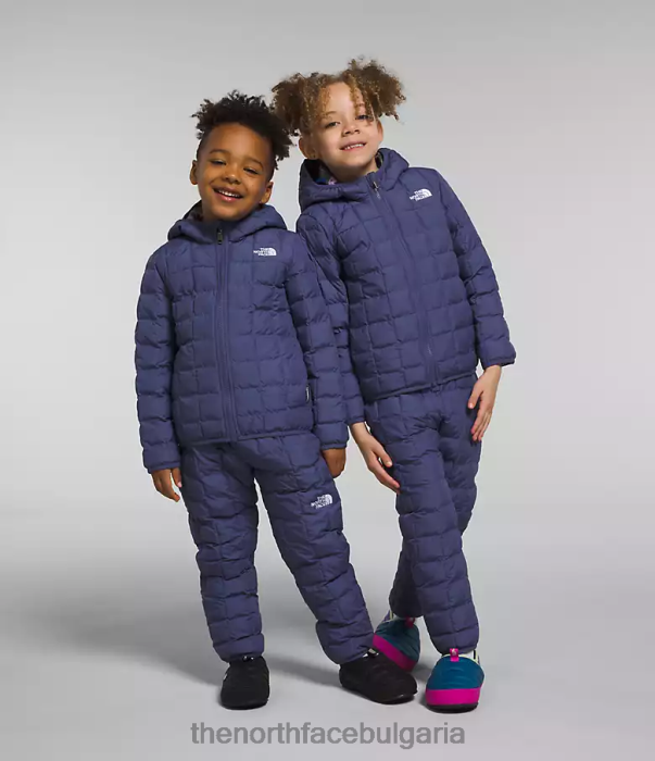 облекло The North Face двустранно термоболно яке с качулка пещерно синьо деца 40DF01237