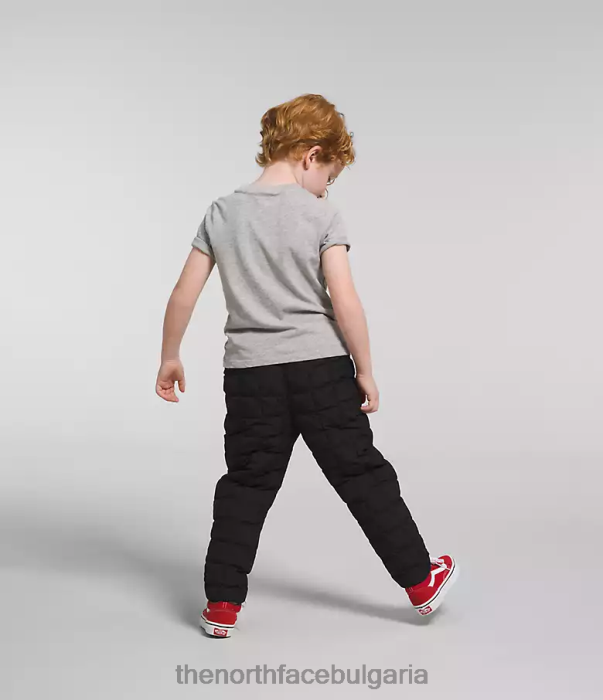 облекло The North Face реверсивни термоболни панталони tnf черно деца 40DF01190